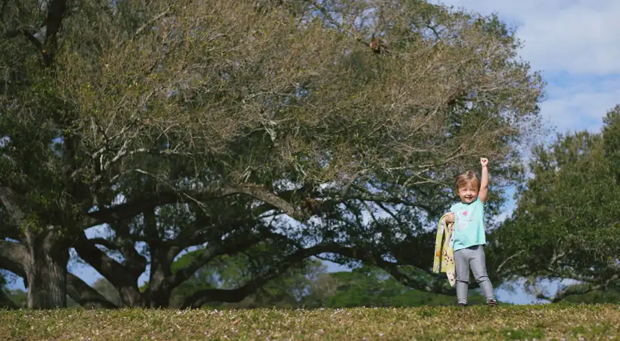 a child is happy to be at a broward county park during summer